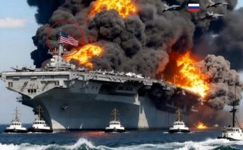 US aircraft carrier burning under Russian jet attack with American flag visible