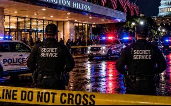secret Service agents guard Hilton entrance during nighttime security incident near